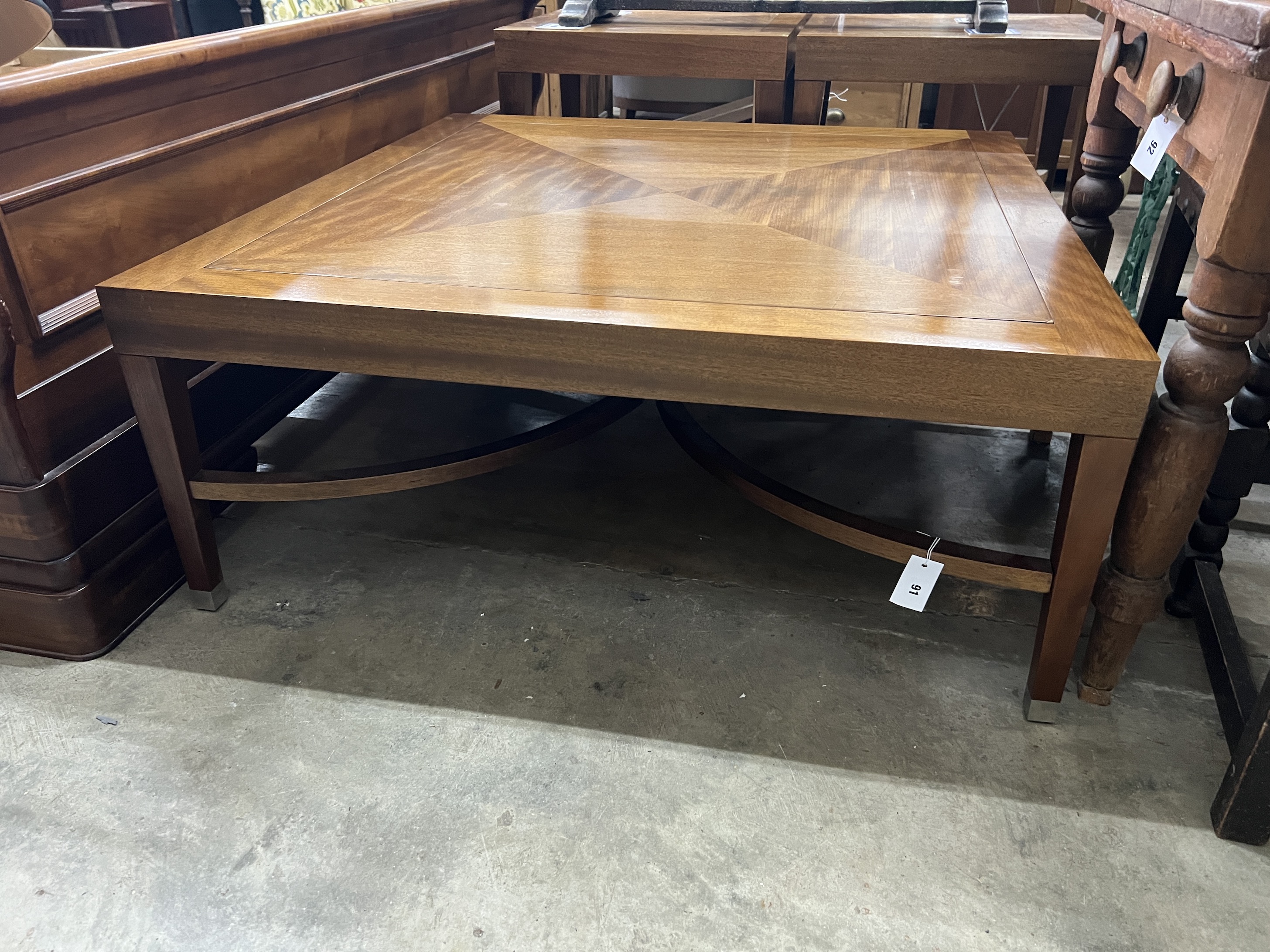 A contemporary South African mahogany square coffee table, width 110cm, height 45cm